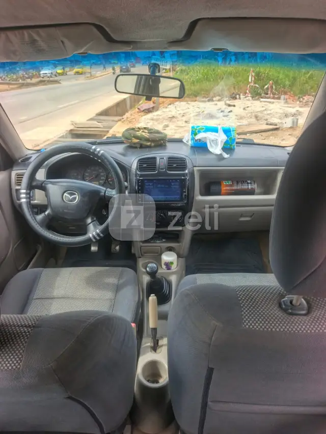 Mazda Demio 2004 — photo 6