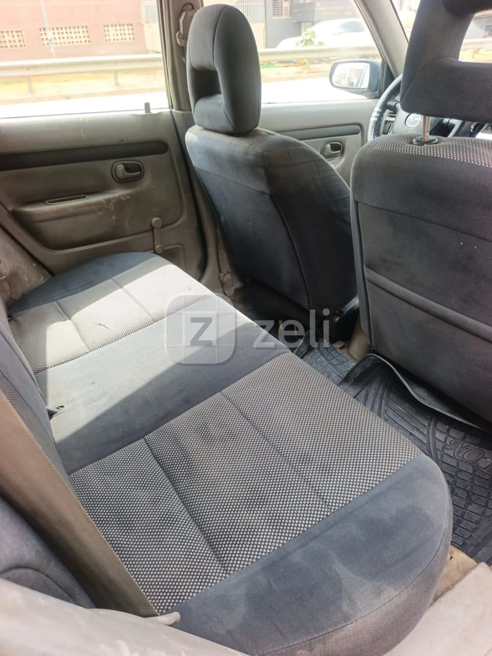 Mazda Demio 2004 — photo 7