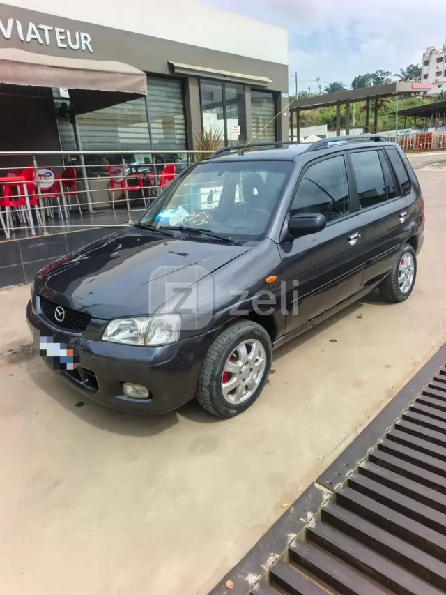 Mazda Demio 2004 — photo 2