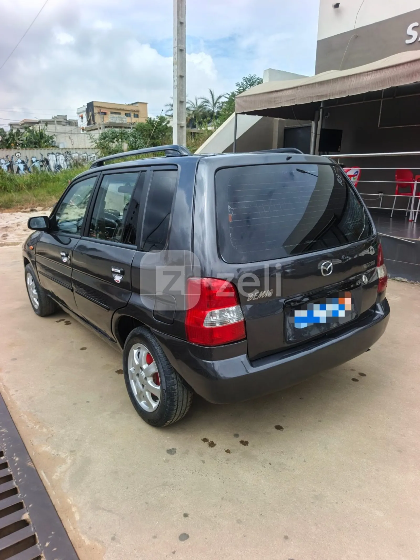 Mazda Demio 2004 — photo 4