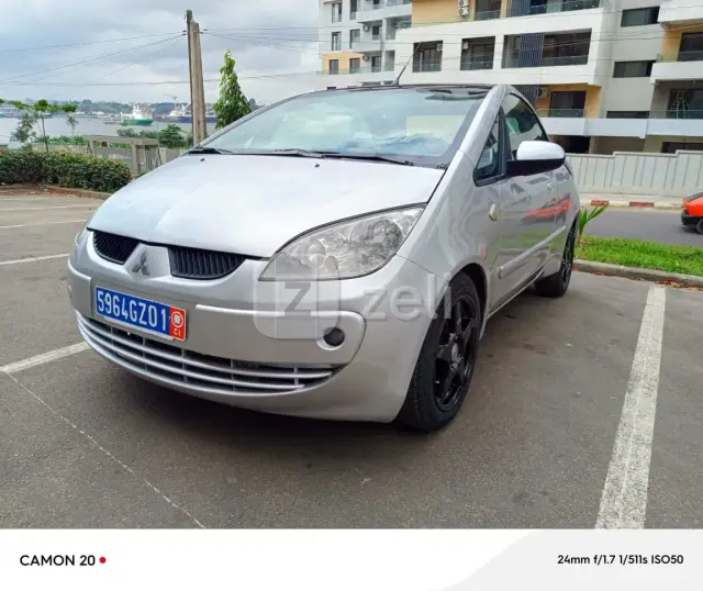 Mitsubishi Colt 2006 — photo 3