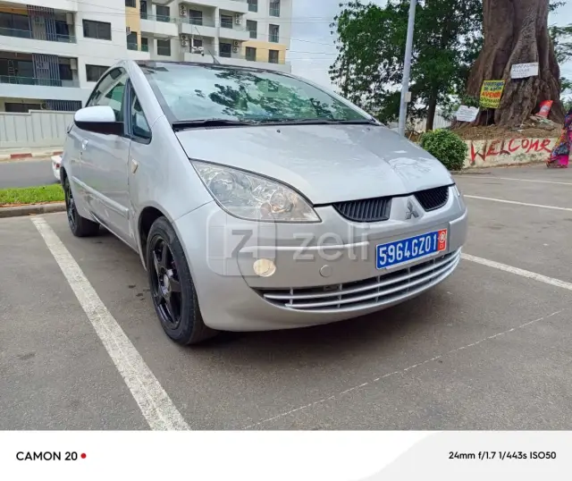 Mitsubishi Colt 2006 — photo 2