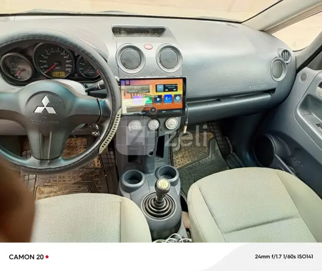 Mitsubishi Colt 2006 — photo 9